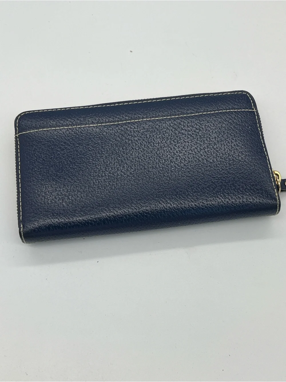 kate spade navy pebbled leather zip wallet with gold plaque